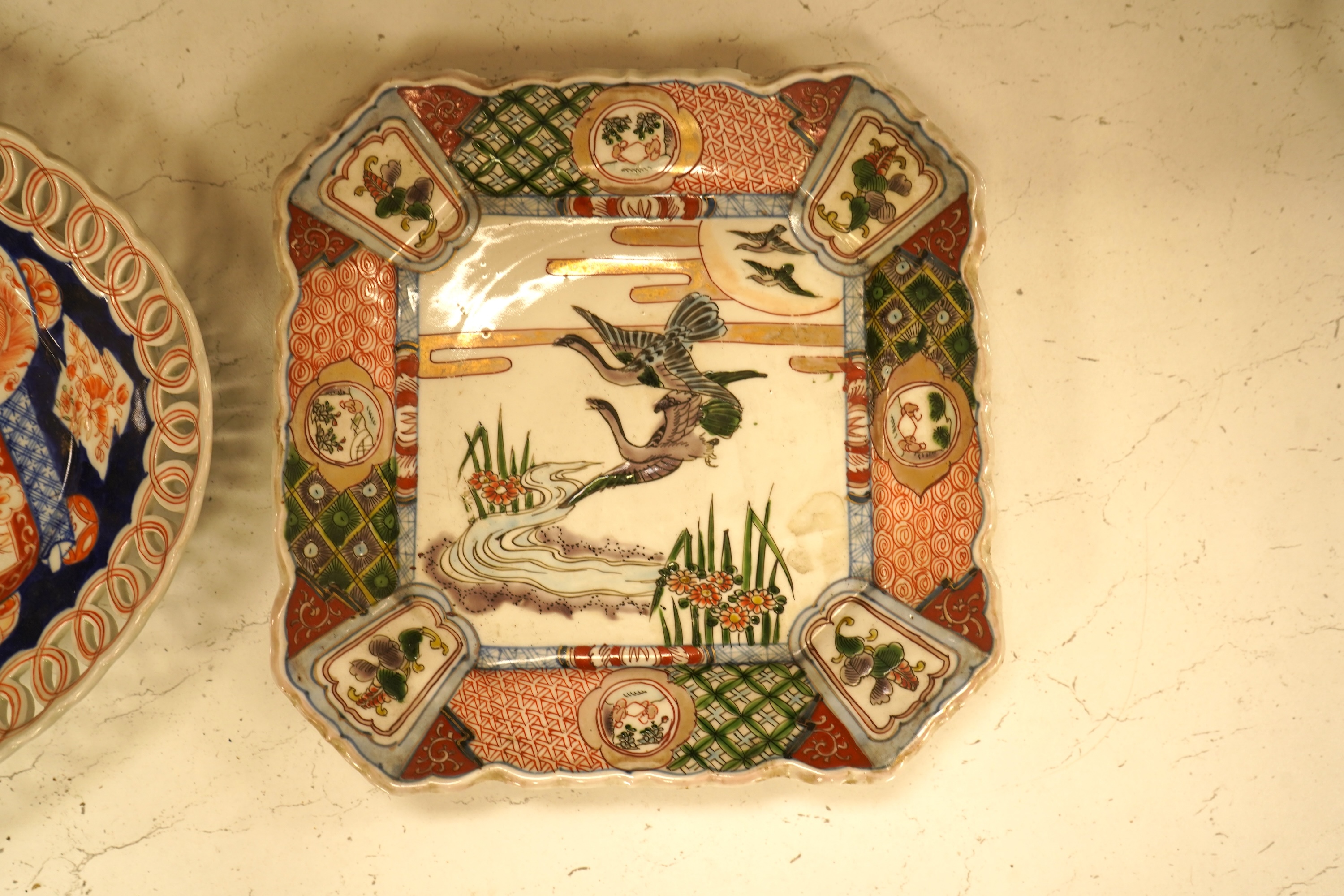 Two Japanese Imari dishes, Meiji period, largest 32.5cm
